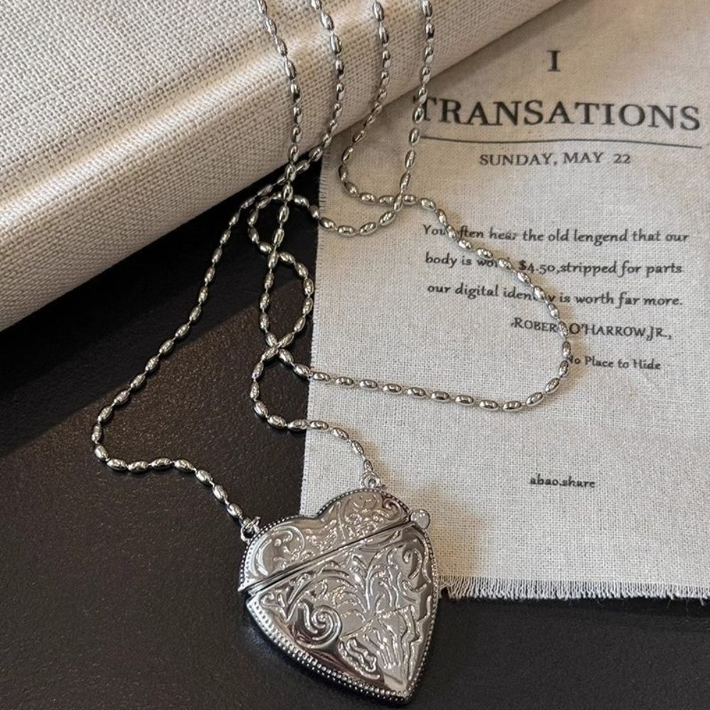 Collar con medallón de corazón - Luxury Bags Photos reseña y precio